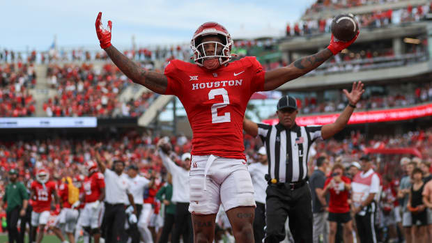 Oct 21, 2023; Houston, Texas, USA; Houston Cougars wide receiver Matthew Golden (2) celebrates after scoring a touchdown during the third quarter against the Texas Longhorns at TDECU Stadium.